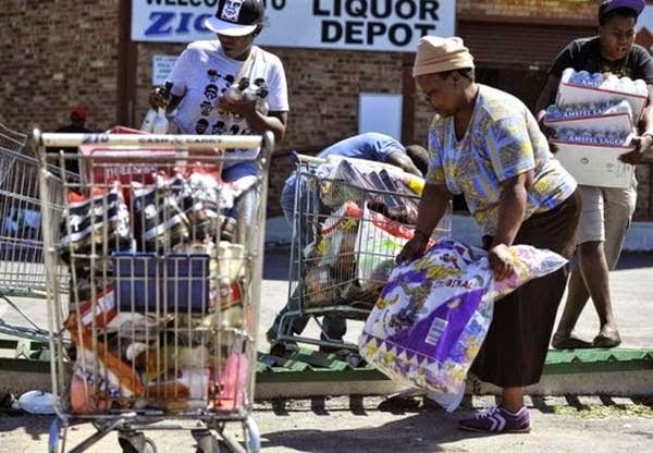Xenophobic Attack: South Africa Loot Foreigners Stores - Pictures