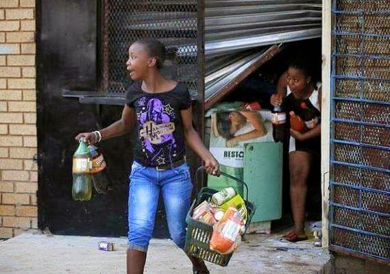 Xenophobic Attack: South Africa Loot Foreigners Stores - Pictures